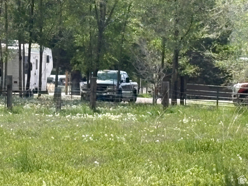 View of yard with fence