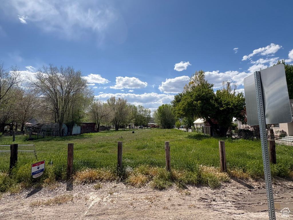 View of yard with fence