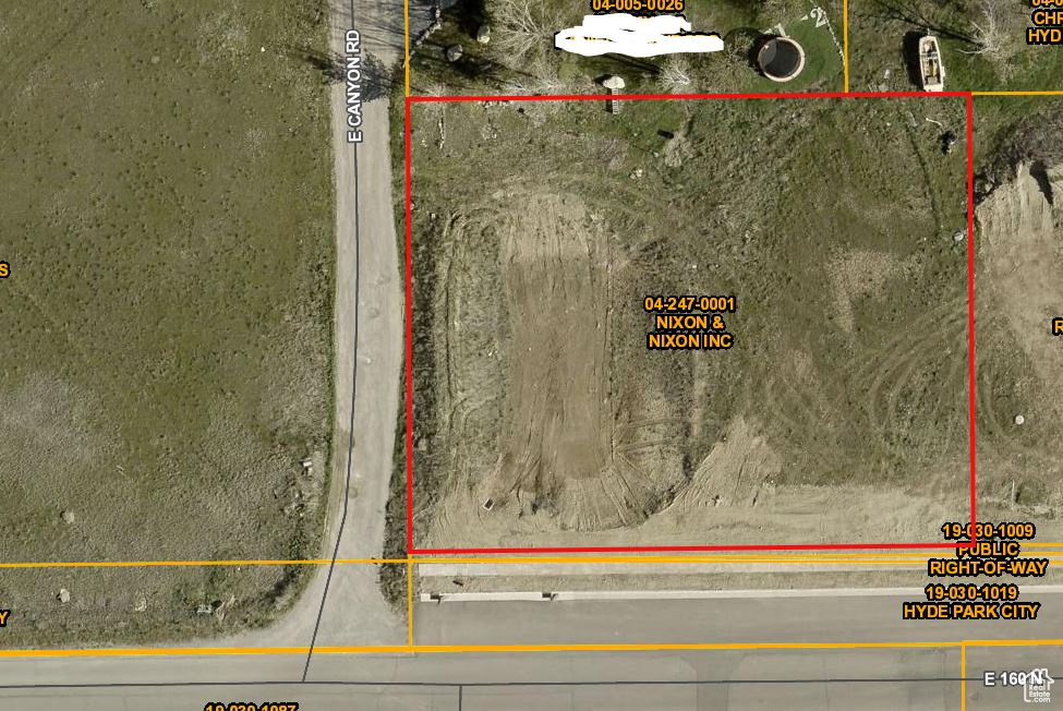 Aerial view of property's location with property parcel outlined
