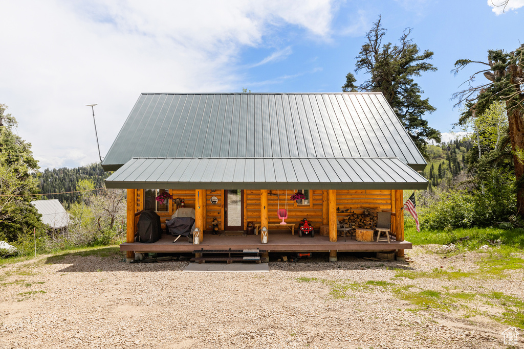 View of front of home featuring metal roof and a standing seam roof