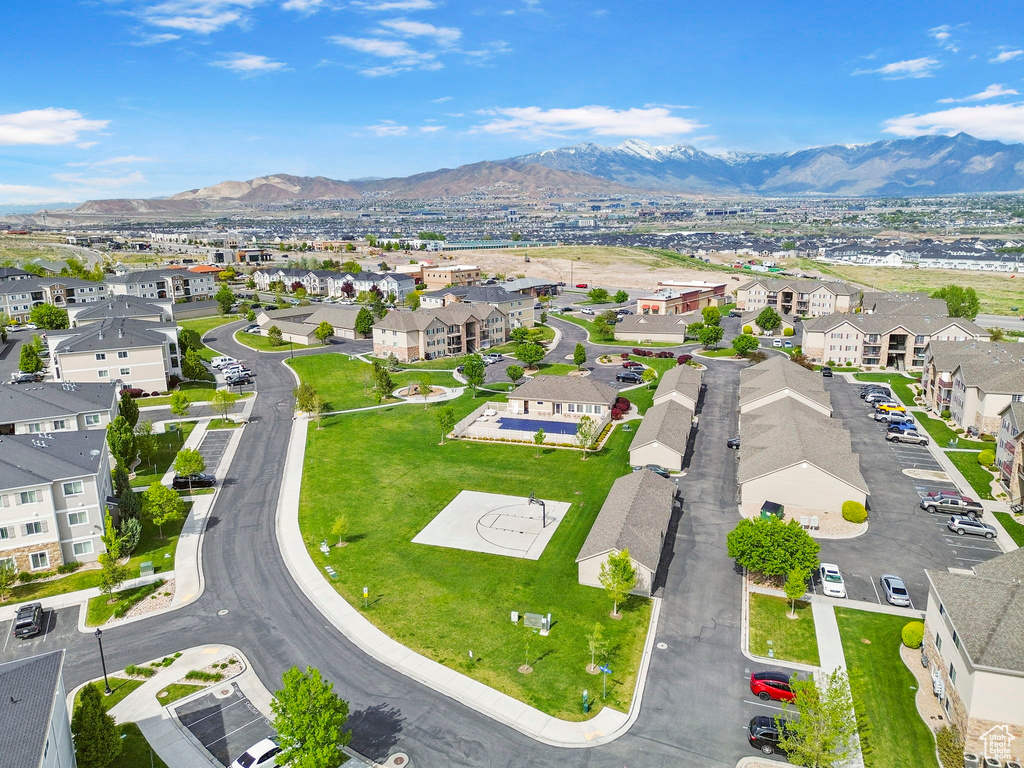 Aerial view of residential area featuring mountains