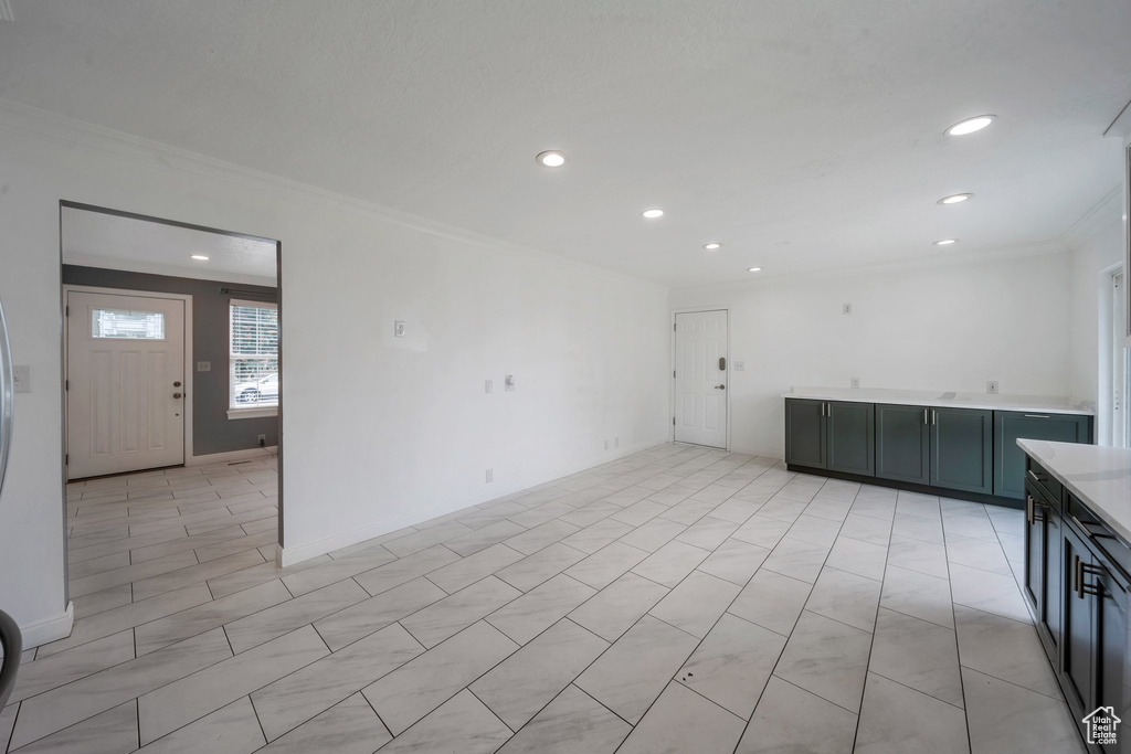 Unfurnished room featuring crown molding and recessed lighting