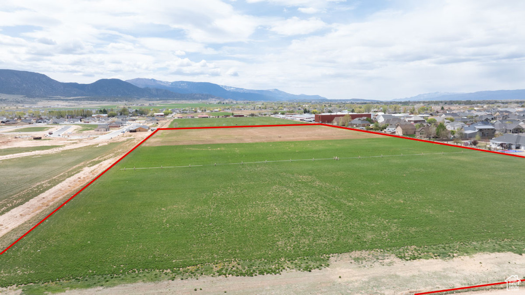 View of yard with a game area and a mountain view