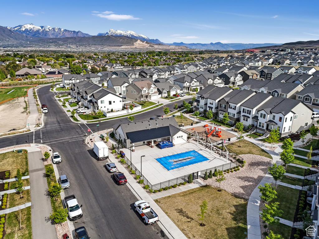 Drone / aerial view with a mountain view and a residential view