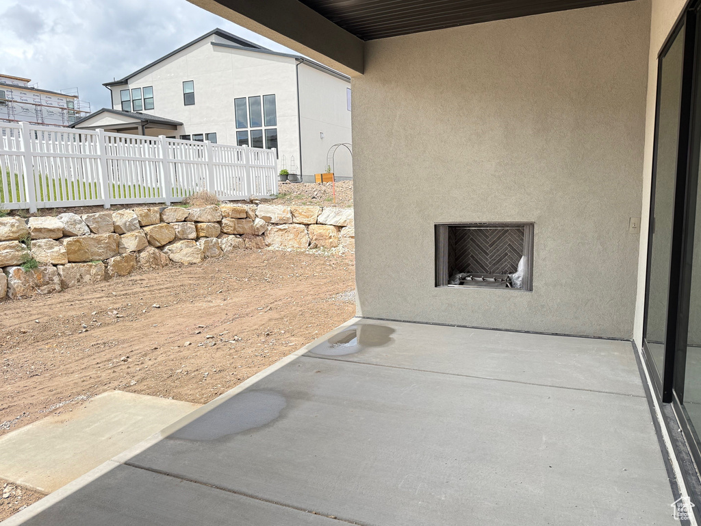 View of patio / terrace featuring fence