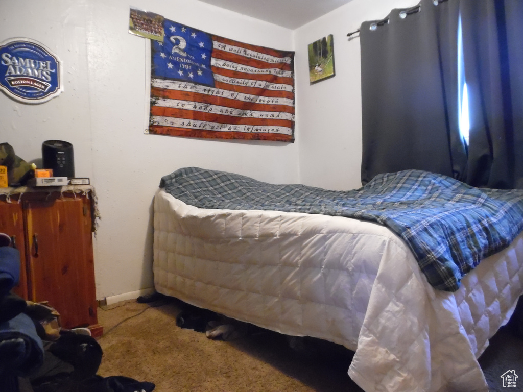 View of carpeted bedroom