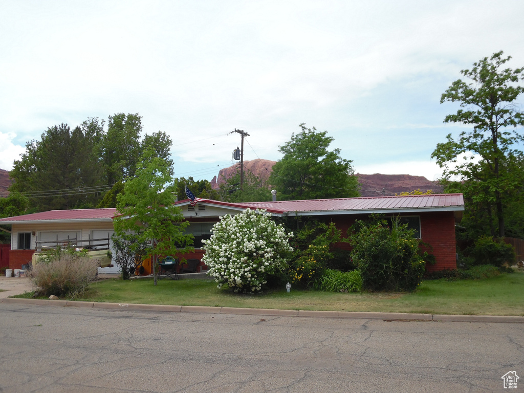 View of front of home with metal roof