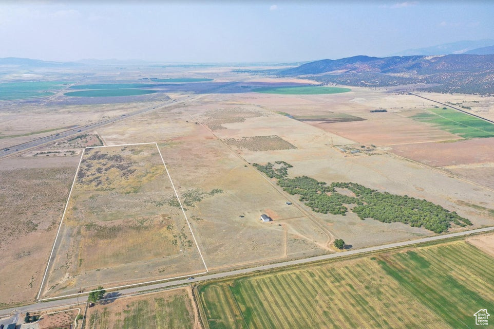 View of rural area with a mountainous background