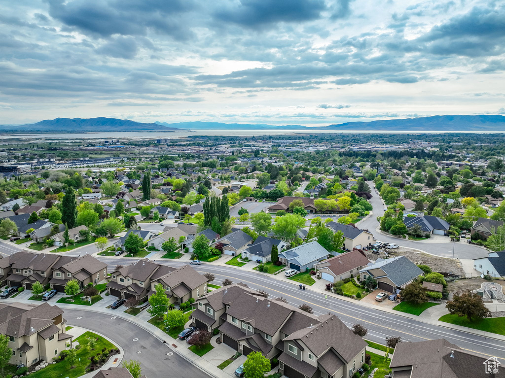 Aerial view of residential area with a mountain backdrop