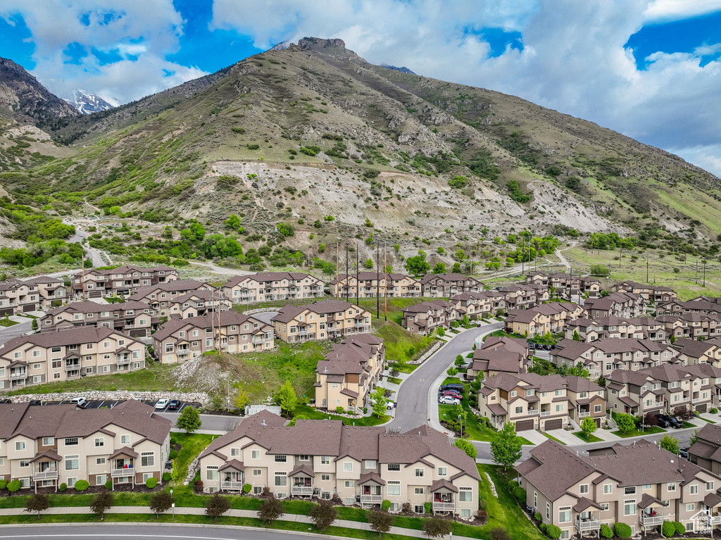 Aerial view of residential area featuring a mountain backdrop