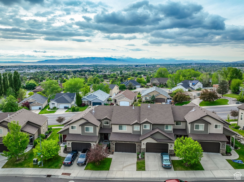Aerial perspective of suburban area featuring mountains