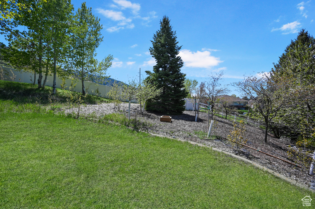 View of yard with fence