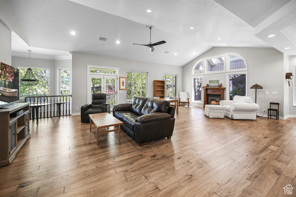 Living area featuring recessed lighting, ceiling fan, and hardwood / wood-style flooring