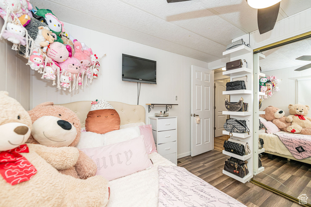 Bedroom with wood finished floors