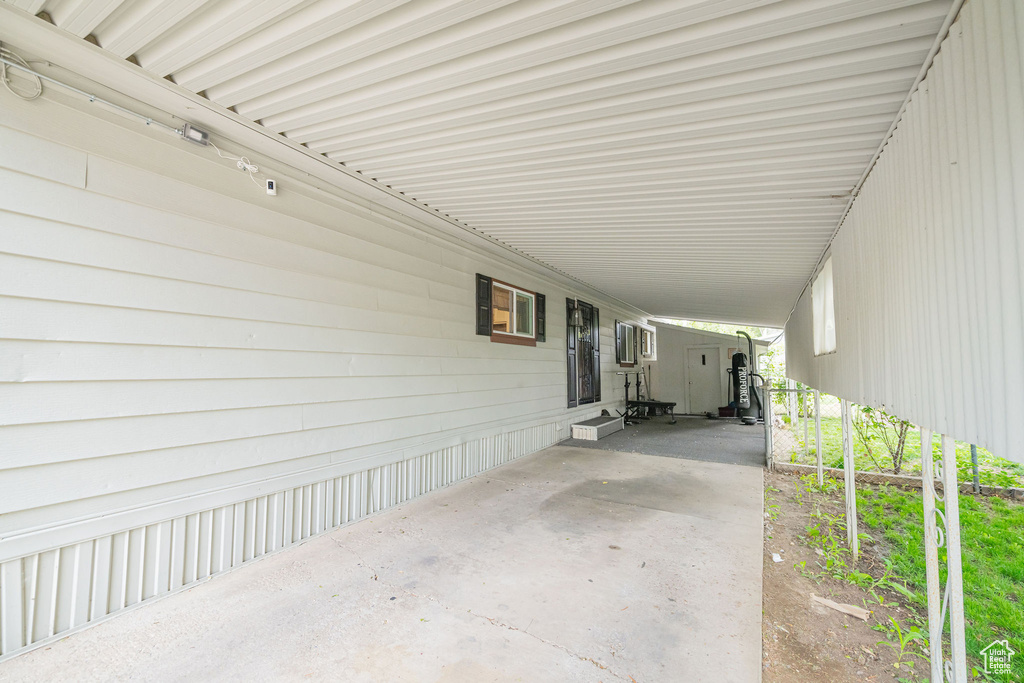 View of patio / terrace with an attached carport