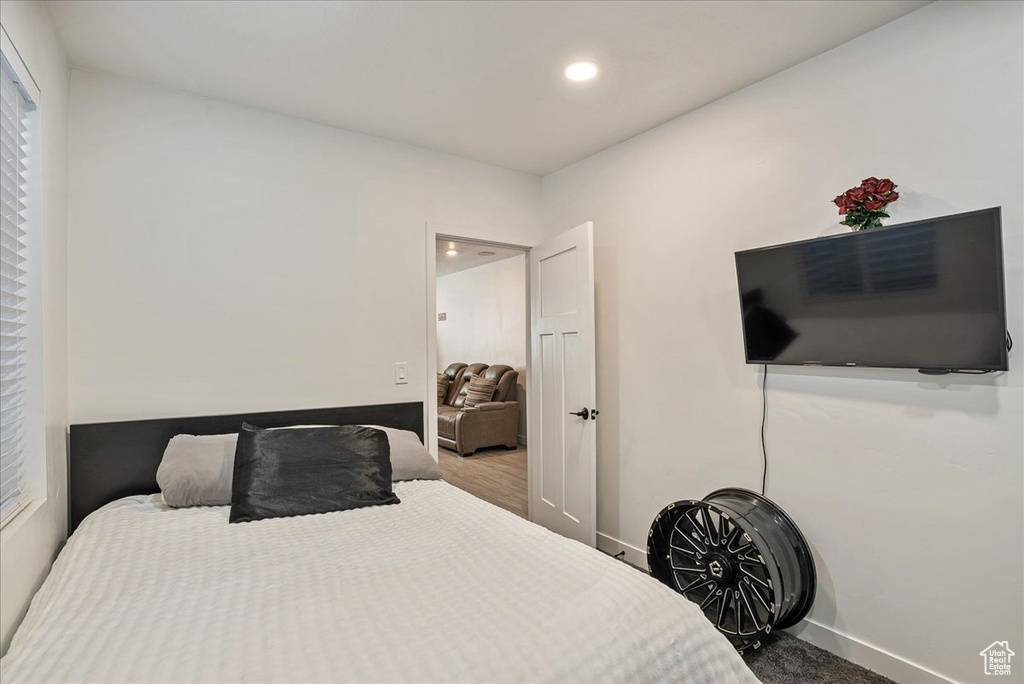 Bedroom featuring baseboards and recessed lighting