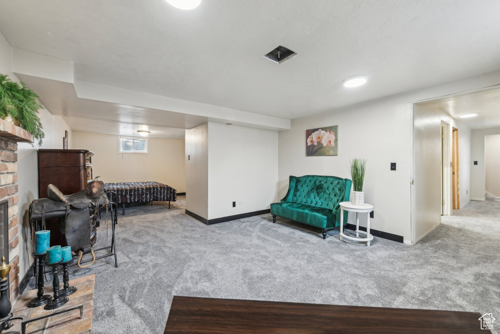 Living area with carpet floors and baseboards