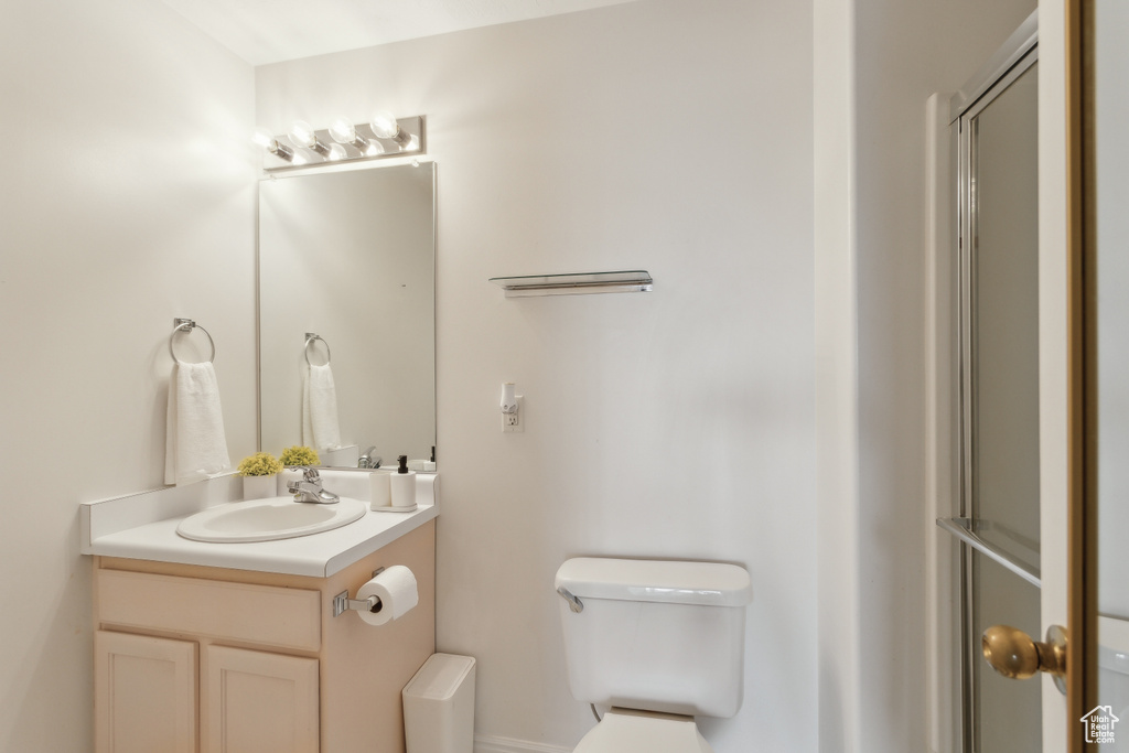 Bathroom featuring toilet and vanity
