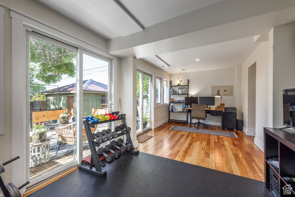 Office featuring baseboards and wood finished floors