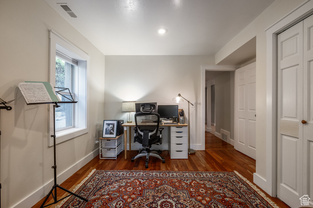 Office area with wood finished floors, baseboards, and recessed lighting