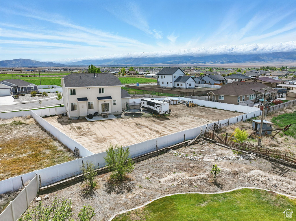 Aerial perspective of suburban area with mountains