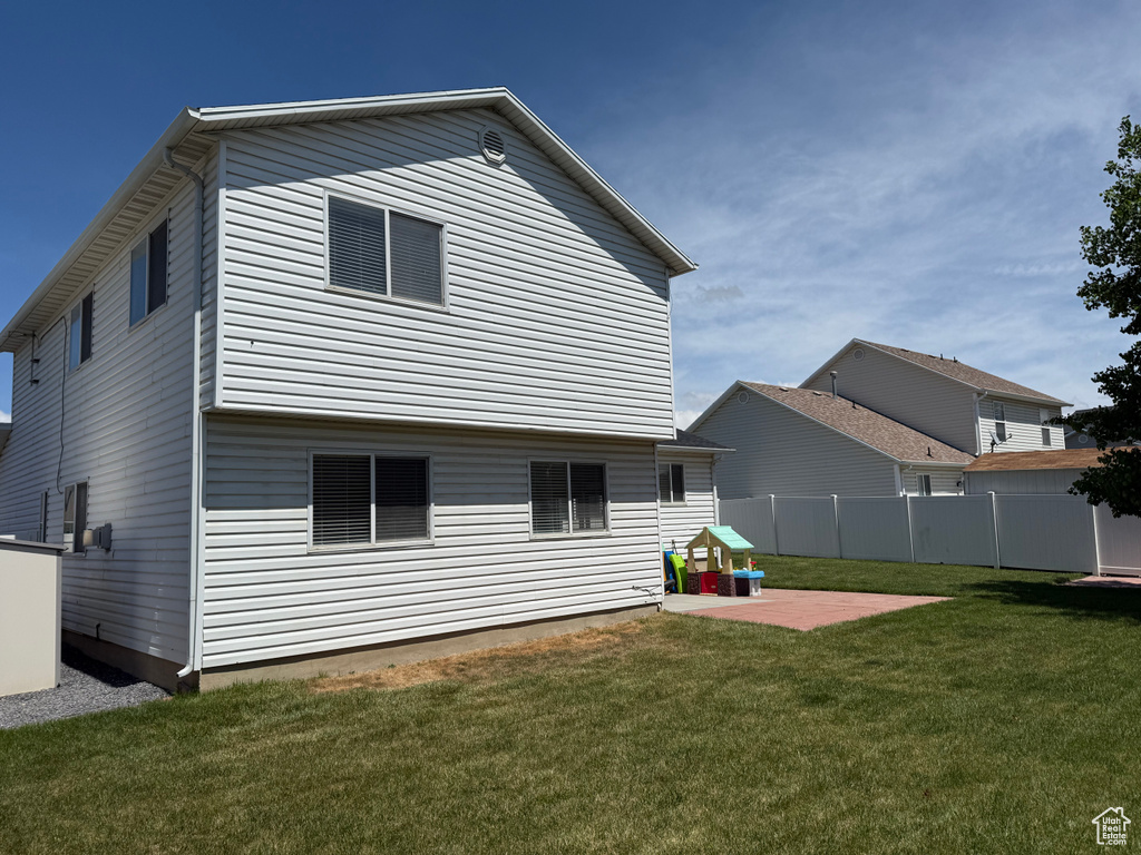 Back of property featuring a patio