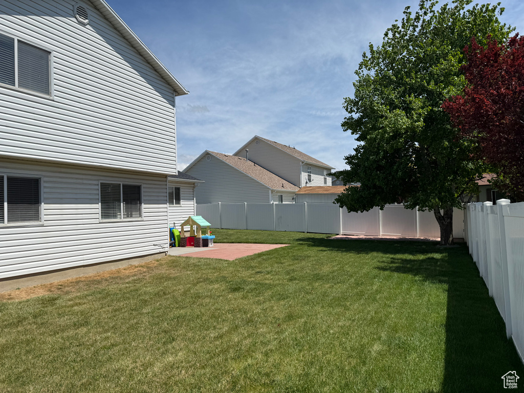 View of yard featuring a patio