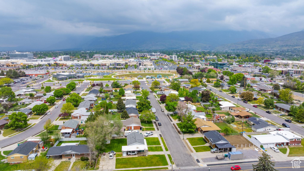 Aerial view of residential area featuring mountains
