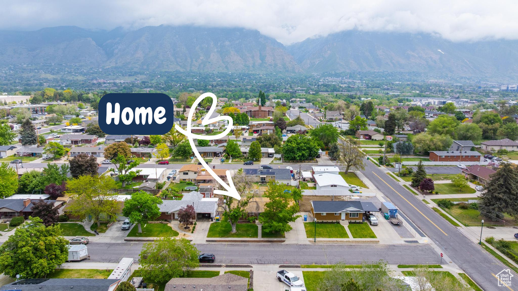 Aerial perspective of suburban area featuring mountains