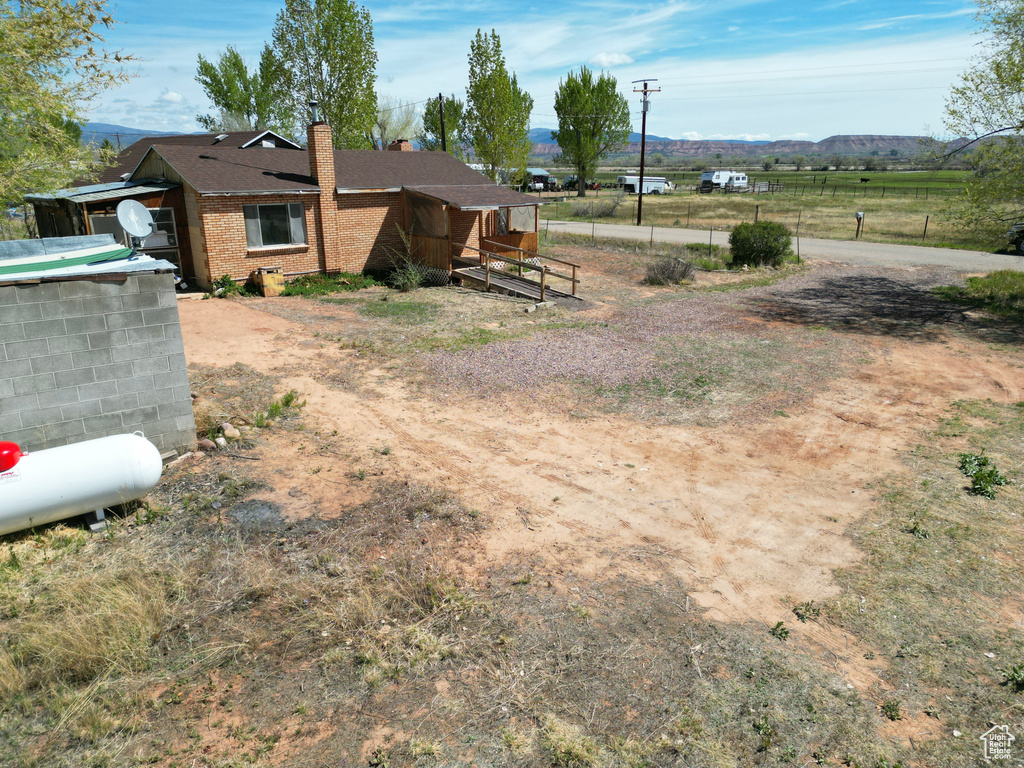 View of yard with fence