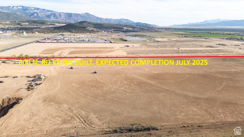 Drone / aerial view of a mountain backdrop