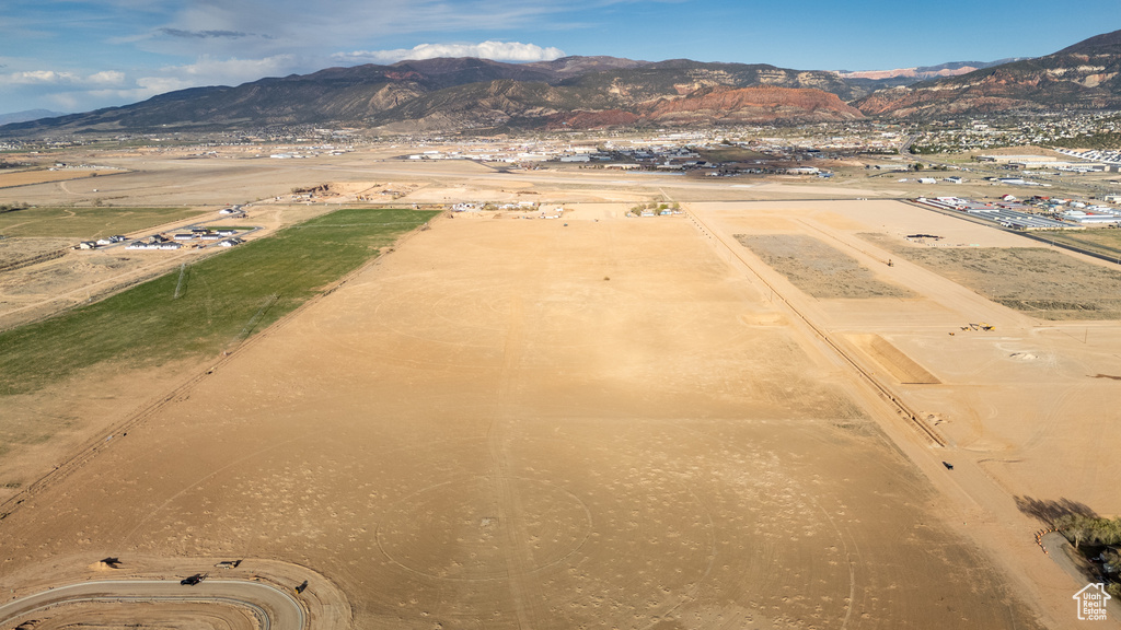 Aerial overview of property's location with mountains and rural landscape