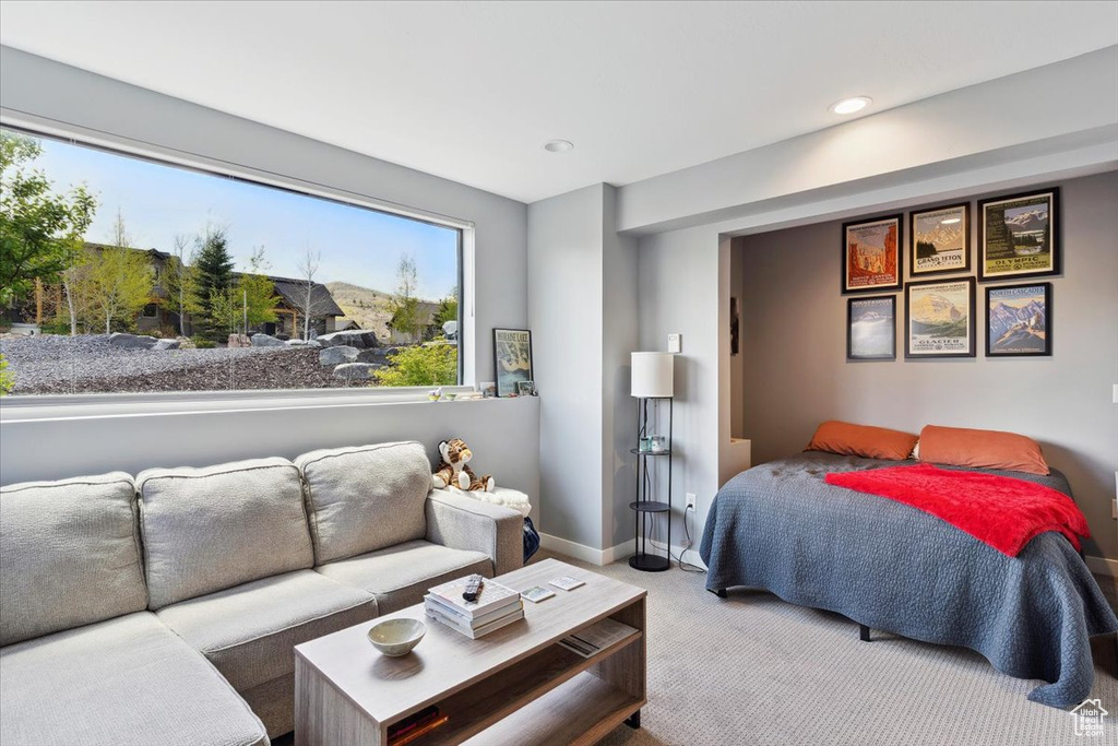 Bedroom featuring carpet flooring, baseboards, and recessed lighting