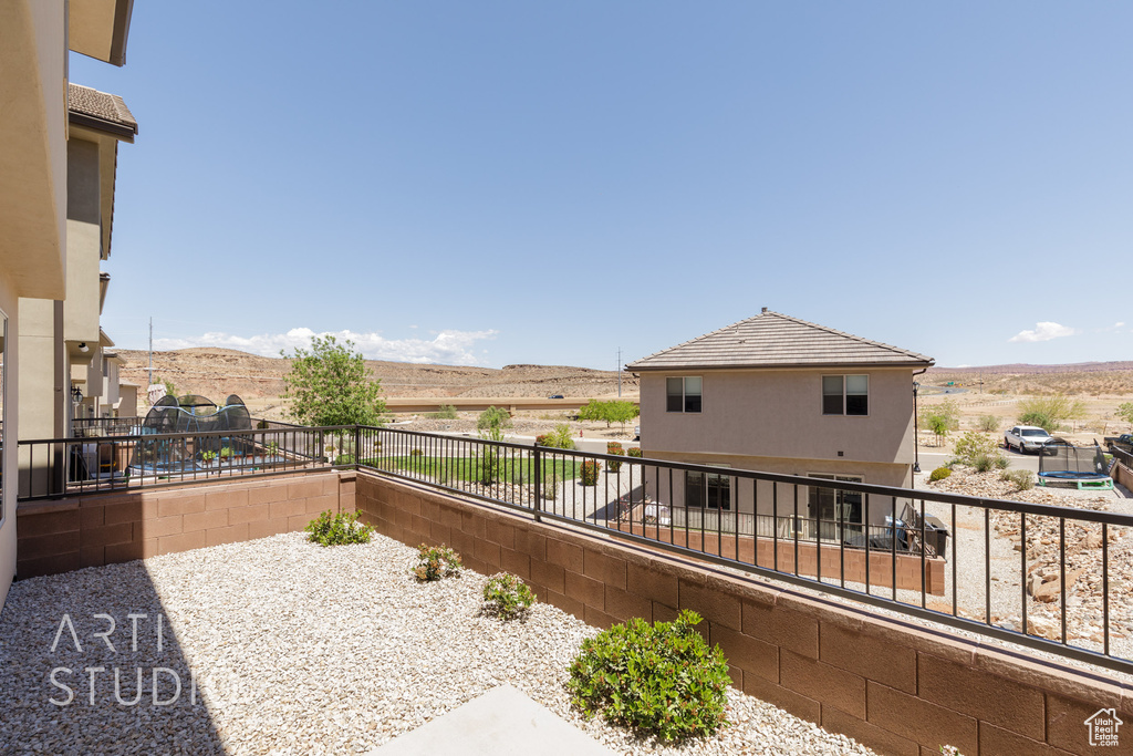 View of patio / terrace featuring a balcony and a mountain view