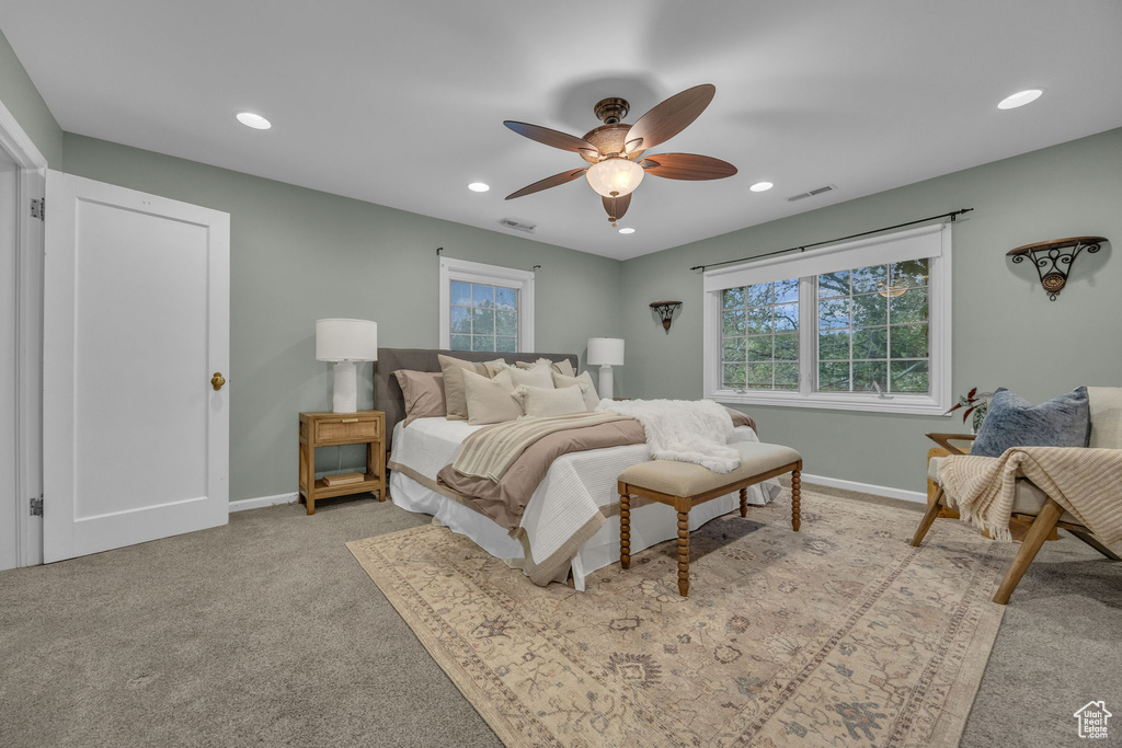 Bedroom featuring recessed lighting, baseboards, ceiling fan, and light colored carpet
