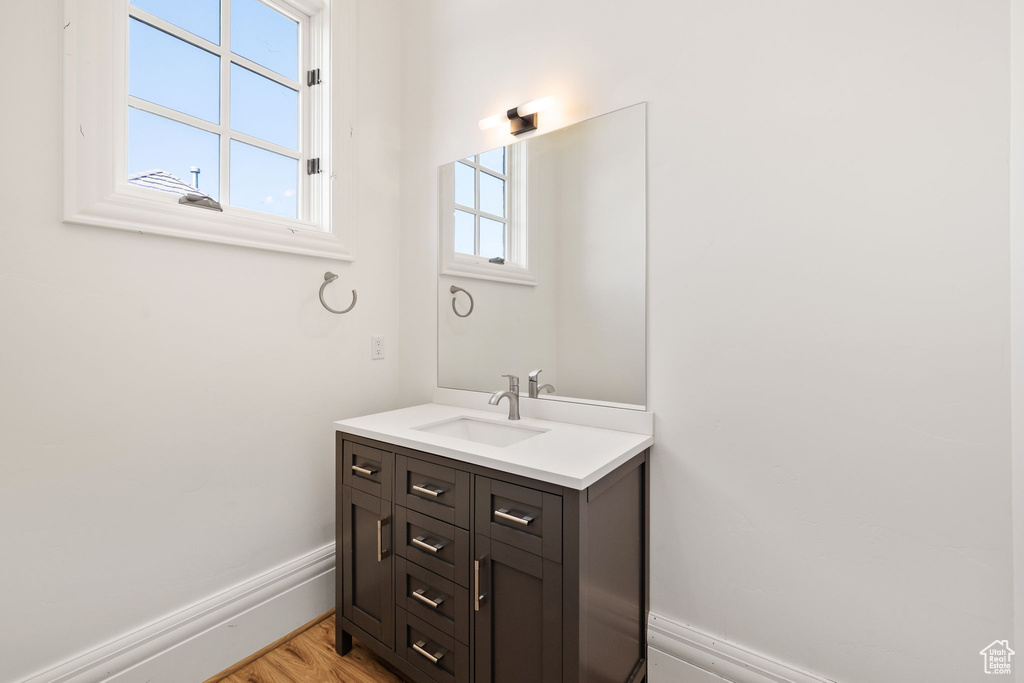 Bathroom with baseboards and vanity