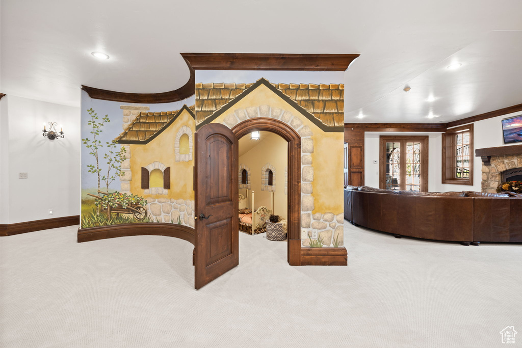 Hallway featuring carpet flooring, crown molding, baseboards, and recessed lighting