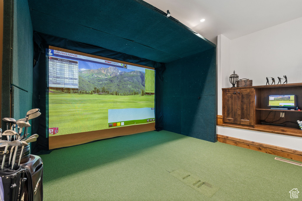 Playroom featuring golf simulator and carpet flooring