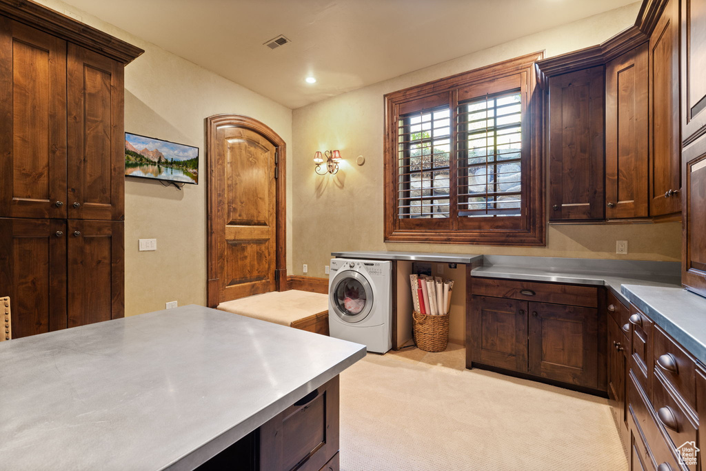 Clothes washing area featuring cabinet space, washer / dryer, visible vents, recessed lighting, and light carpet