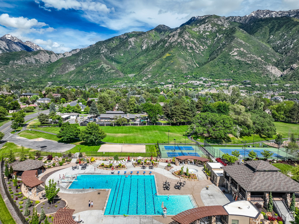 Community pool featuring a mountain view