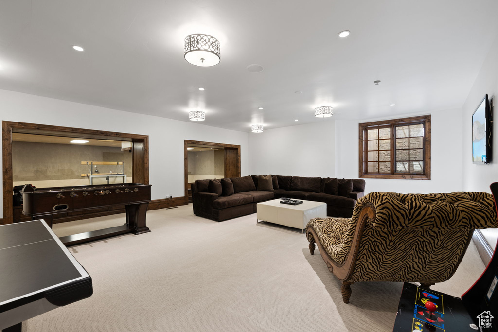 Living room with carpet and recessed lighting