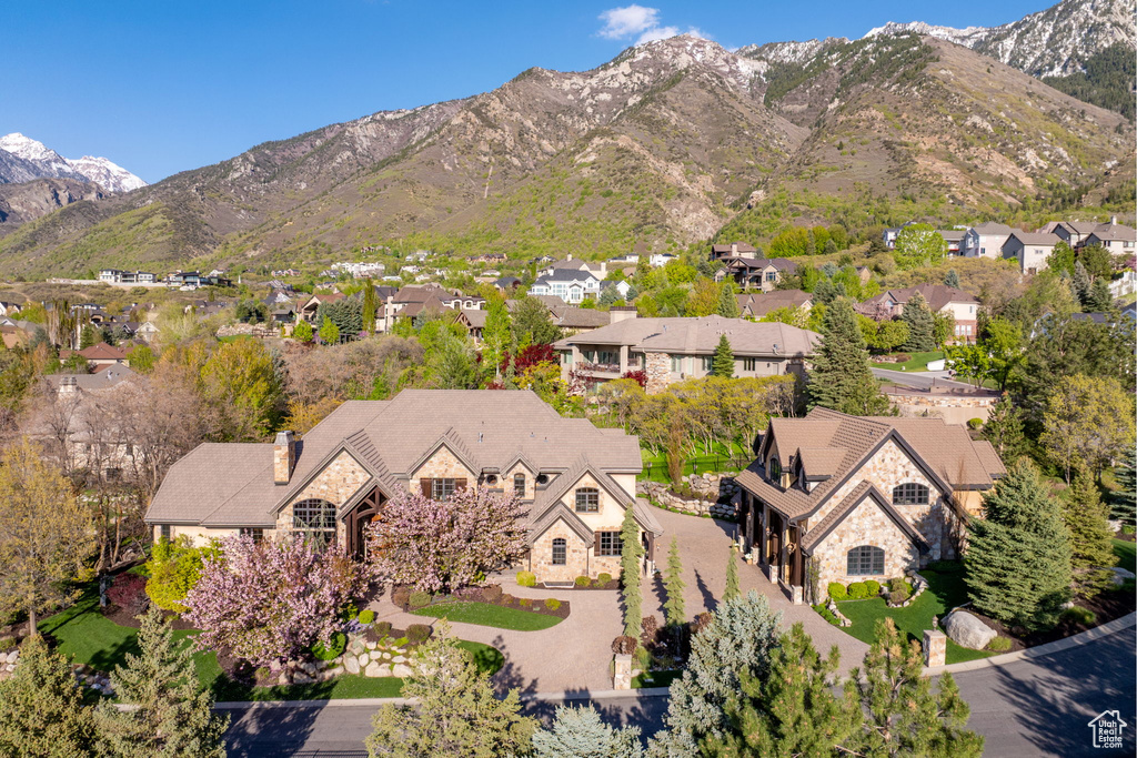 Birds eye view of property featuring a mountain view and a residential view