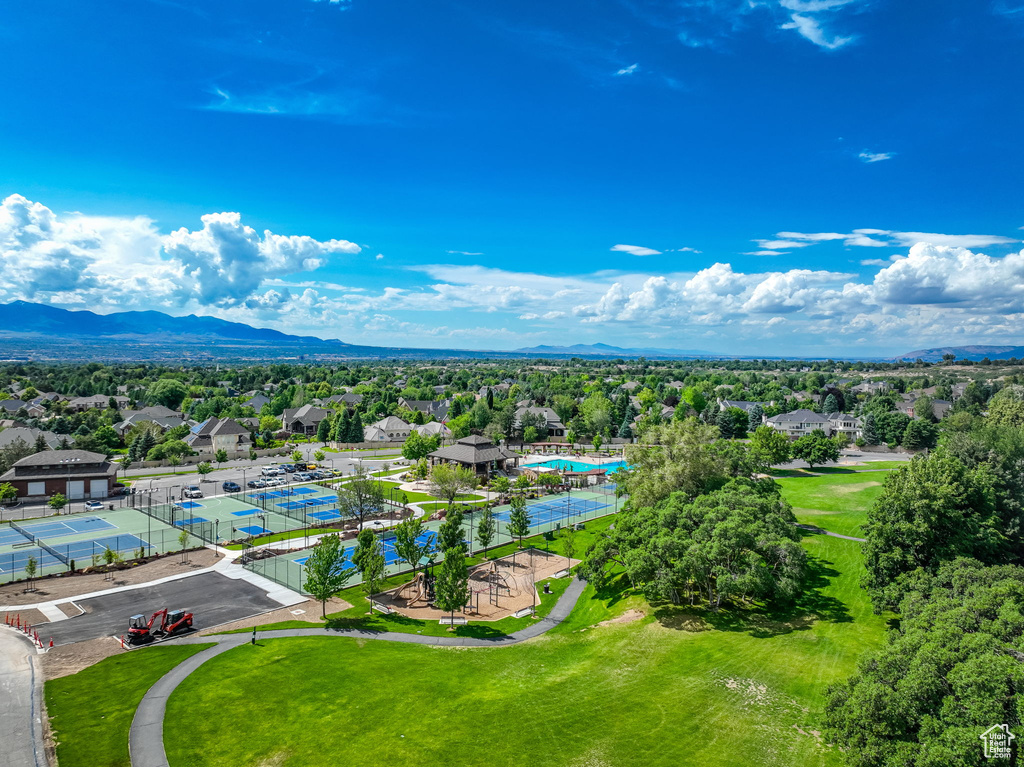 Aerial view of residential area featuring mountains