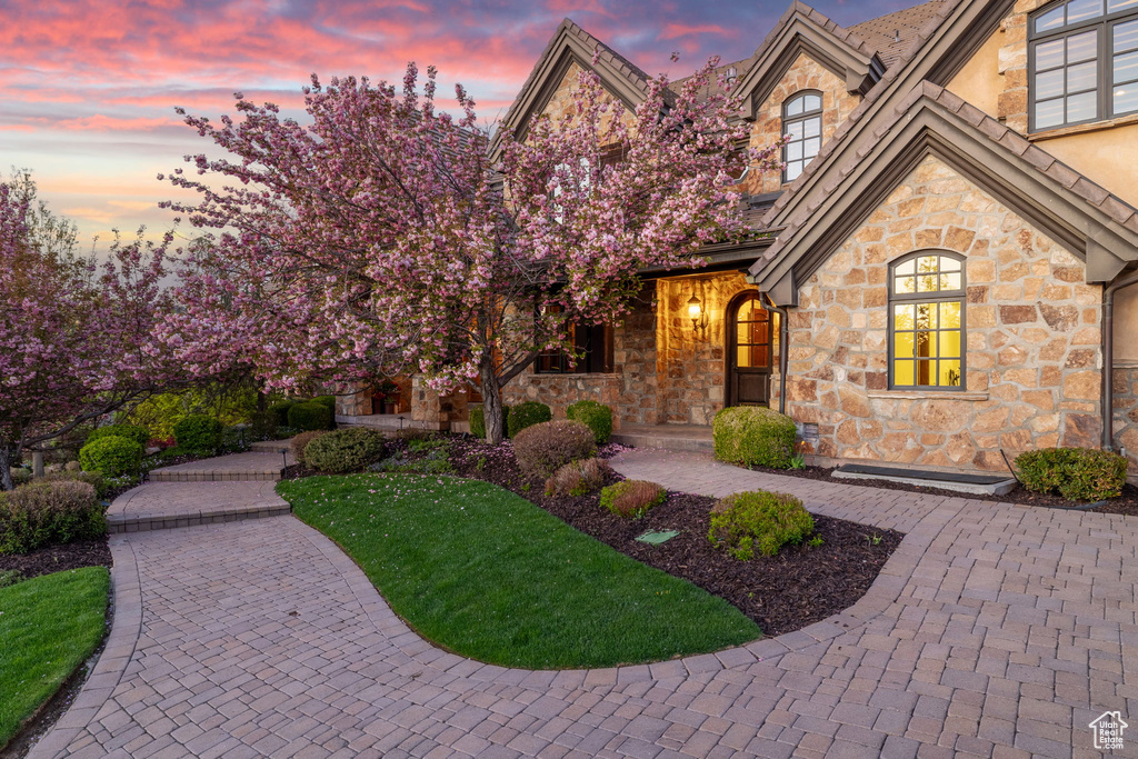 View of front facade with stone siding