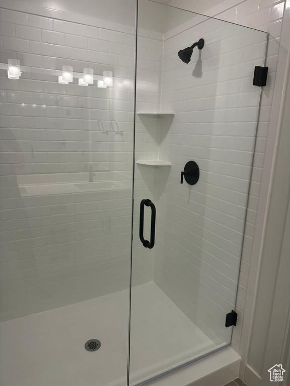 Full bath with a shower stall