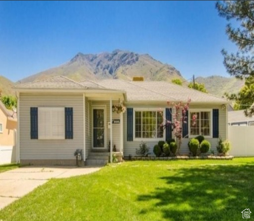 Single story home with a mountain view