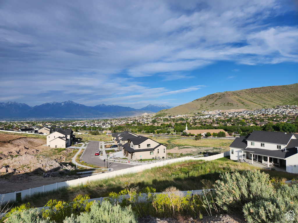 View of mountain background featuring nearby suburban area