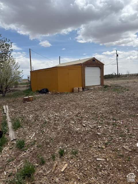 View of outbuilding featuring an outdoor structure