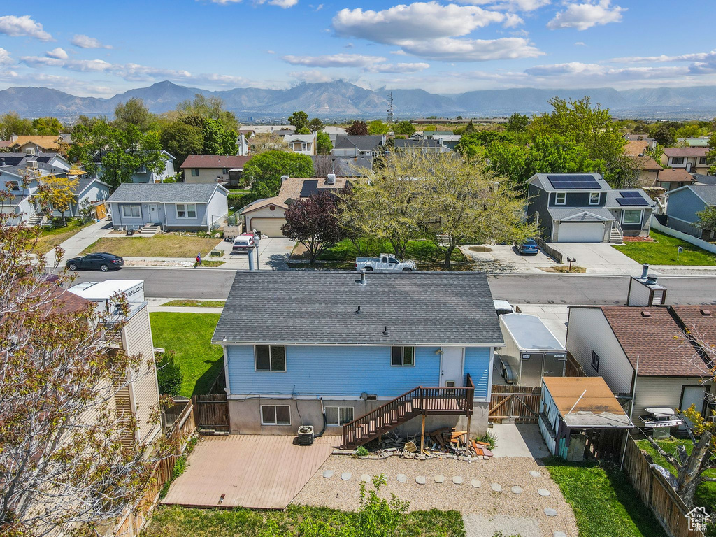 Aerial perspective of suburban area with mountains
