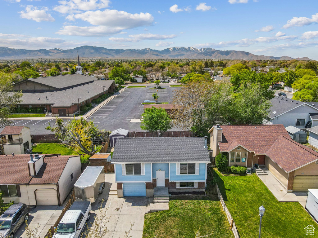 Aerial perspective of suburban area featuring mountains